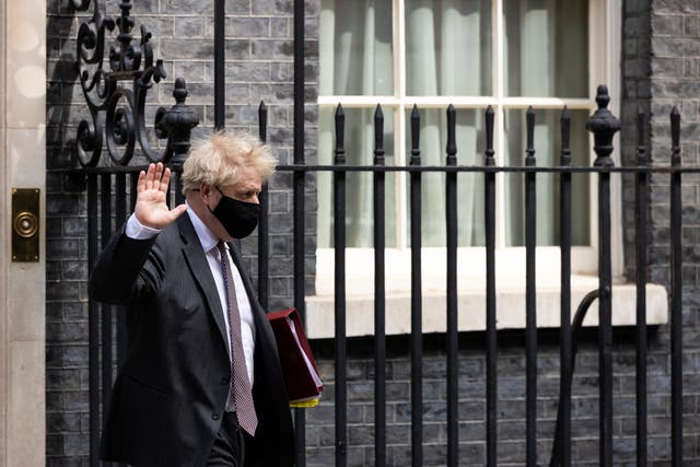 Boris Johnson leaves Downing Street, where his private flat recently underwent a luxury refurbishment