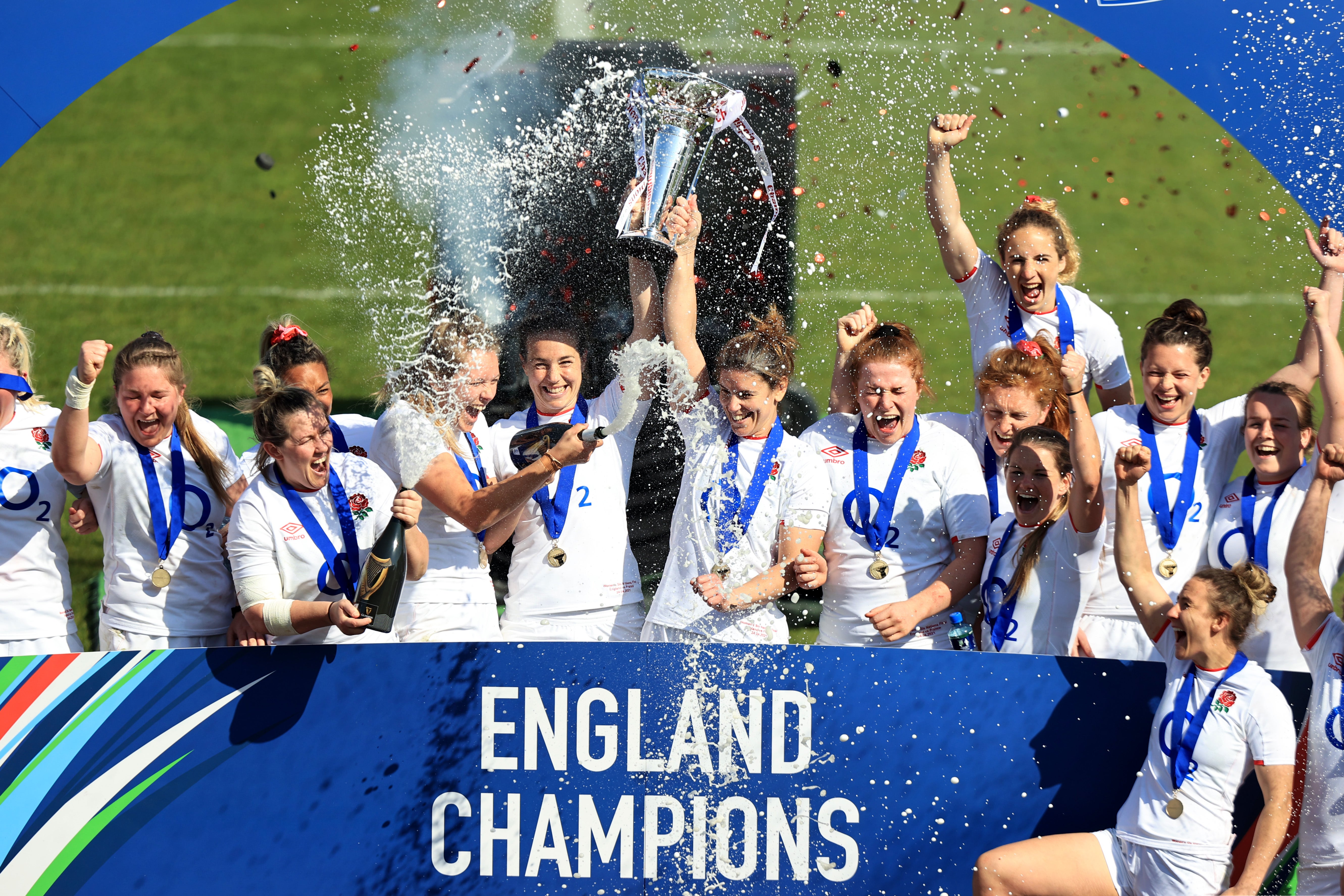 Emily Scarratt and Sarah Hunter of England lift the Six Nations Trophy