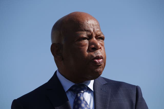 <p>U.S. Rep. John Lewis (D-GA) listens during a news conference September 25, 2017 on Capitol Hill in Washington, DC</p>