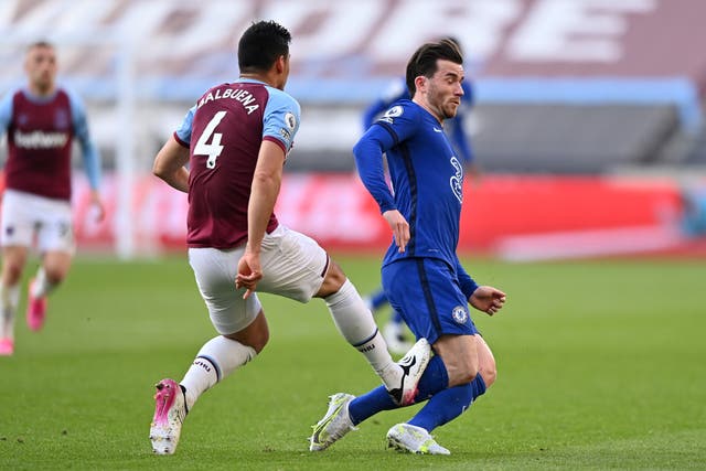 Ben Chilwell of Chelsea is fouled by Fabian Balbuena of West Ham United