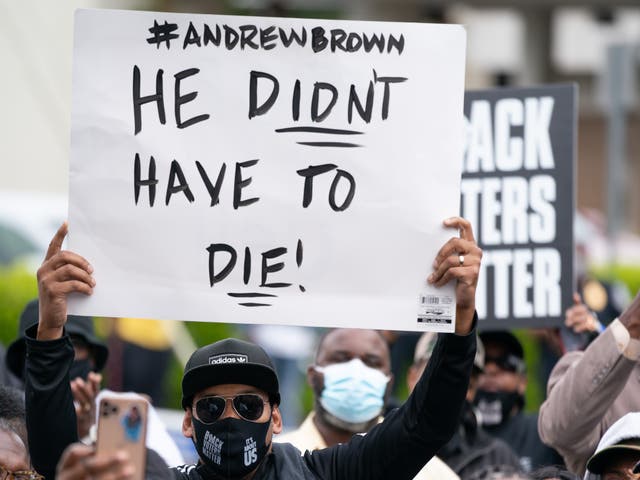 <p>Demonstrators gather outside a government building during an emergency city council meeting April 23, 2021 in Elizabeth City, North Carolina. Protestors gathered as elected officials discussed the possible release of police body camera footage from the shooting death of Andrew Brown Jr. on 21 April. </p>