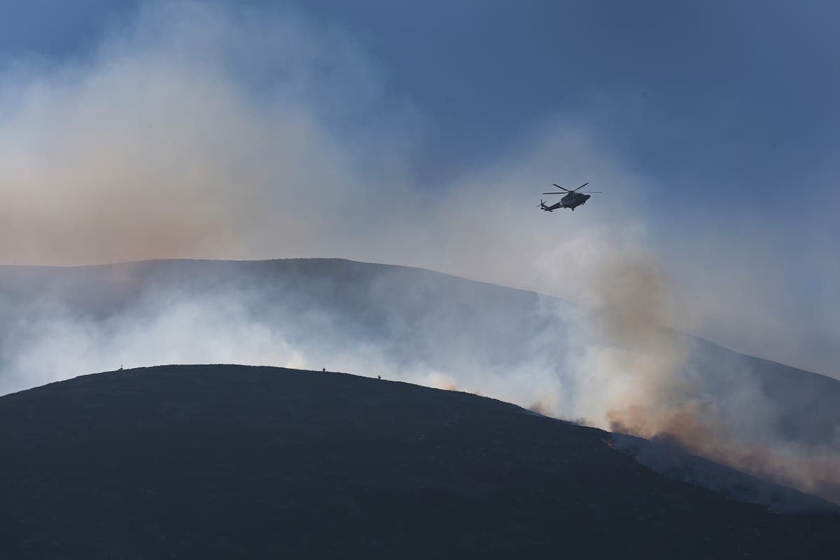 Mourne Mountains fire: Helicopters flown in as fire crews tackle blaze for third day