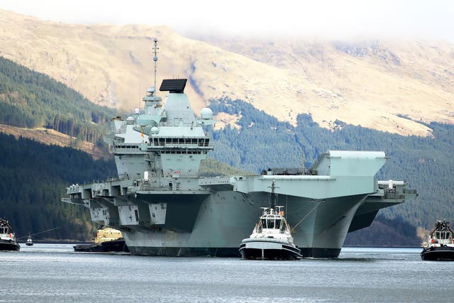 <p>HMS Queen Elizabeth leaving Glen Mallan, in Loch Long, before her first operational deployment last month</p>