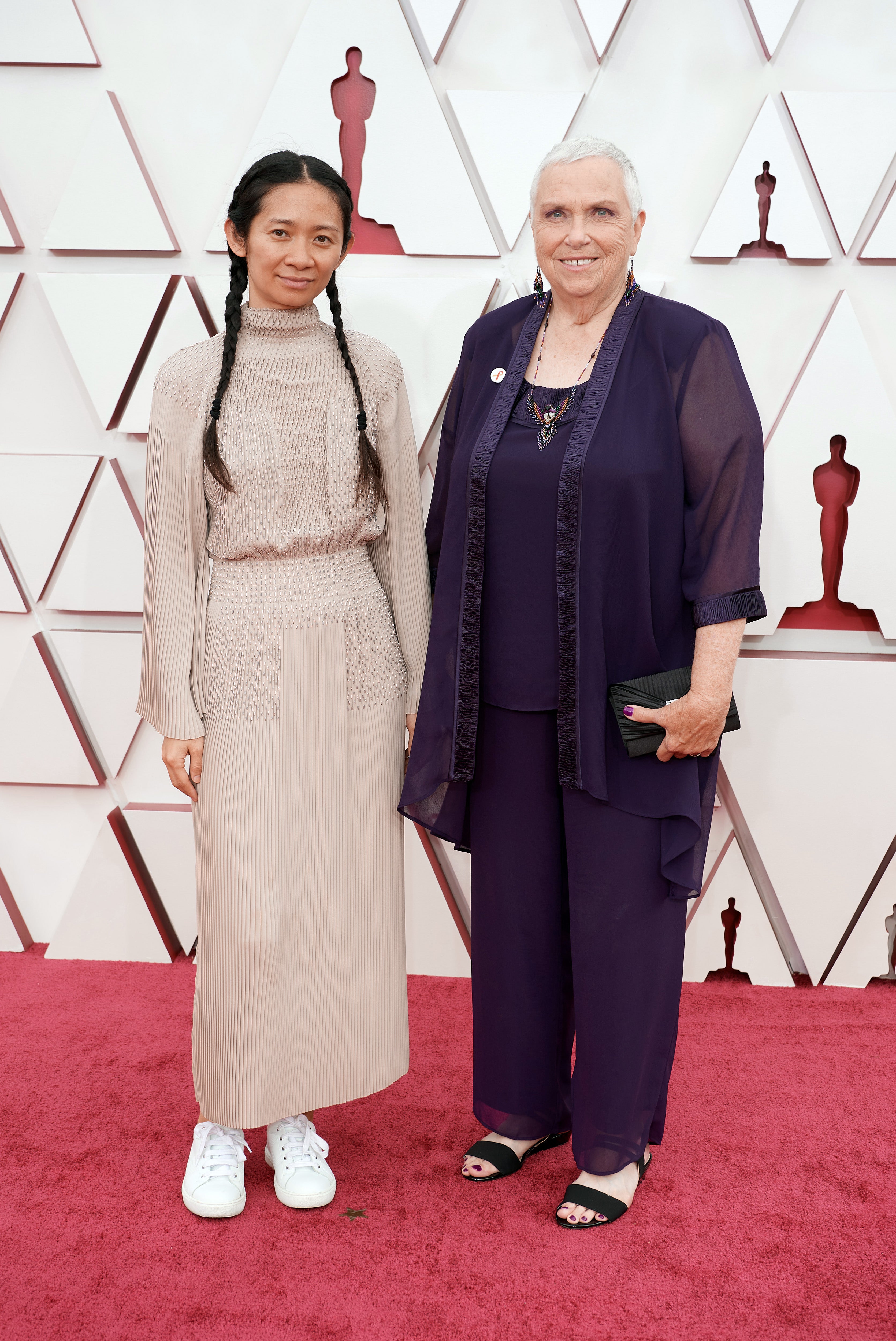 Chloé Zhao and Charlene Swankie attend the 2021 Academy Awards