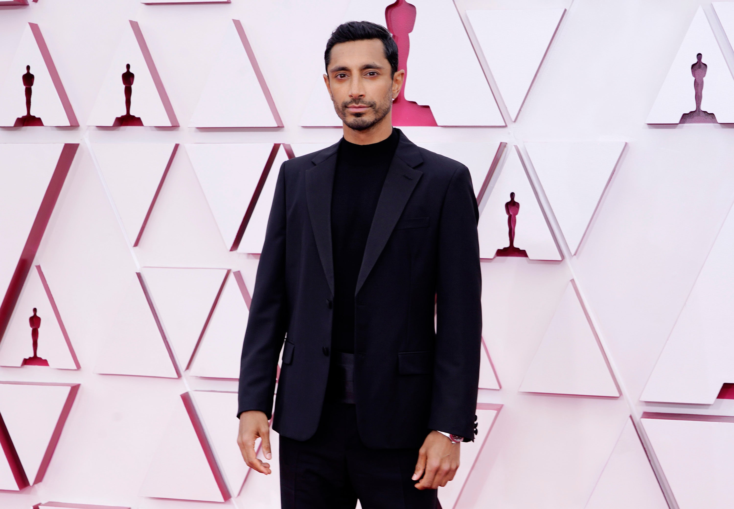Riz Ahmed at the 2021 Oscars wearing Prada