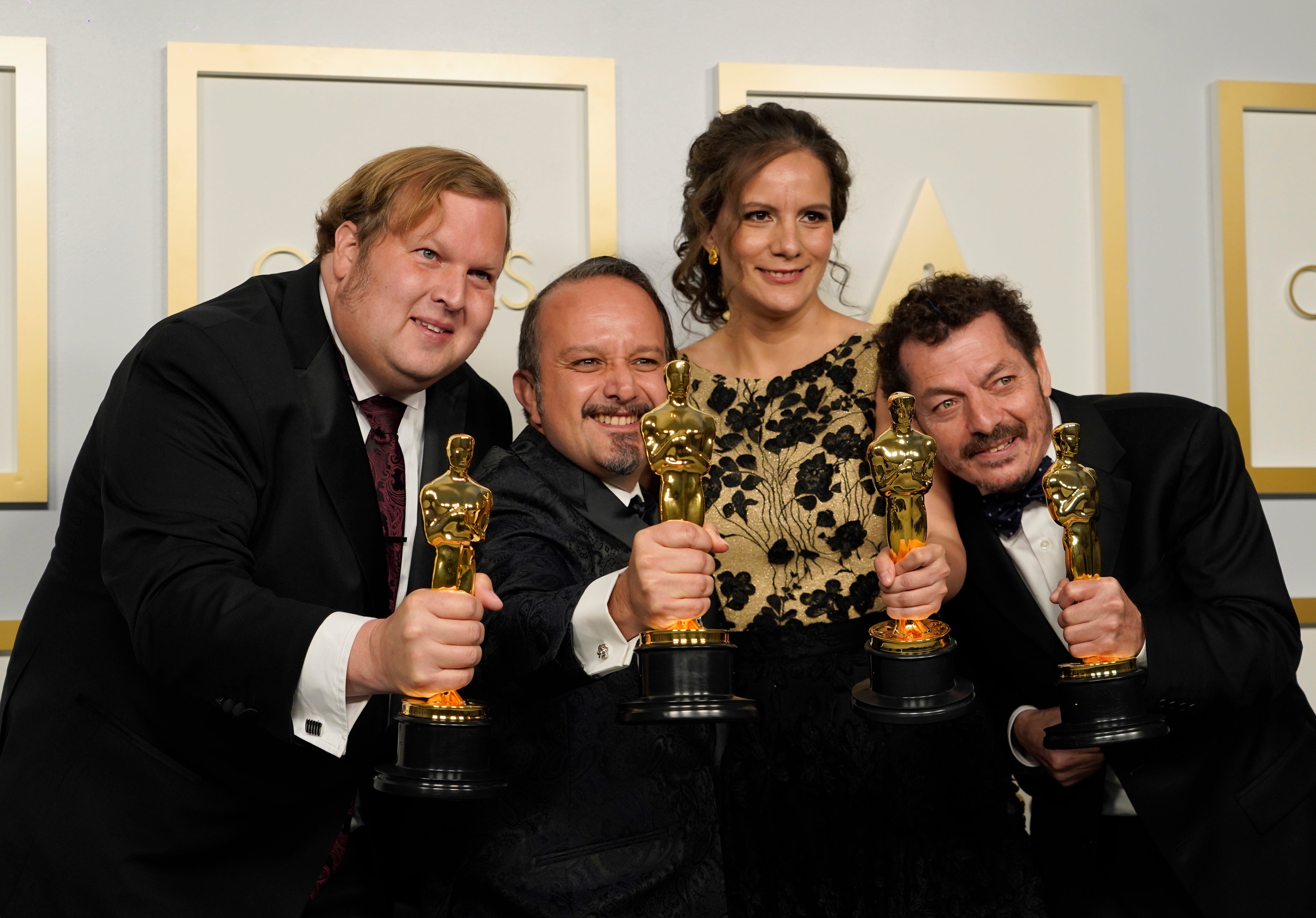 Phillip Bladh, Carlos Cortes, Michellee Couttolenc and Jaime Baksht, winners of the award for Best Sound for ‘Sound of Metal’