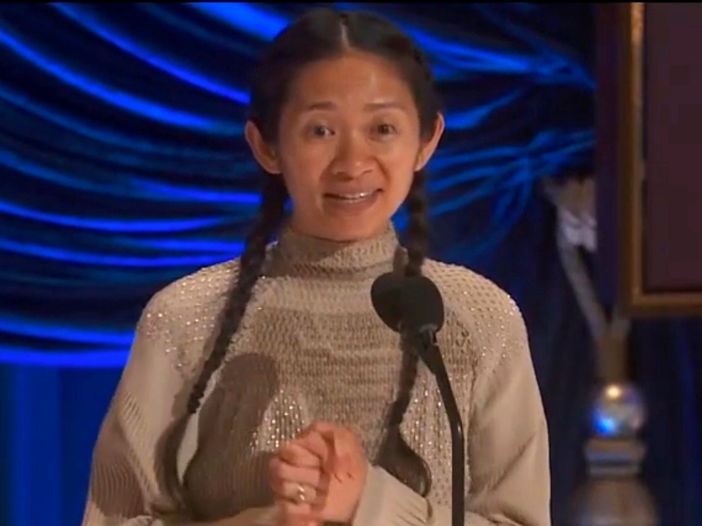 Chloe Zhao accepting the award for Best Director