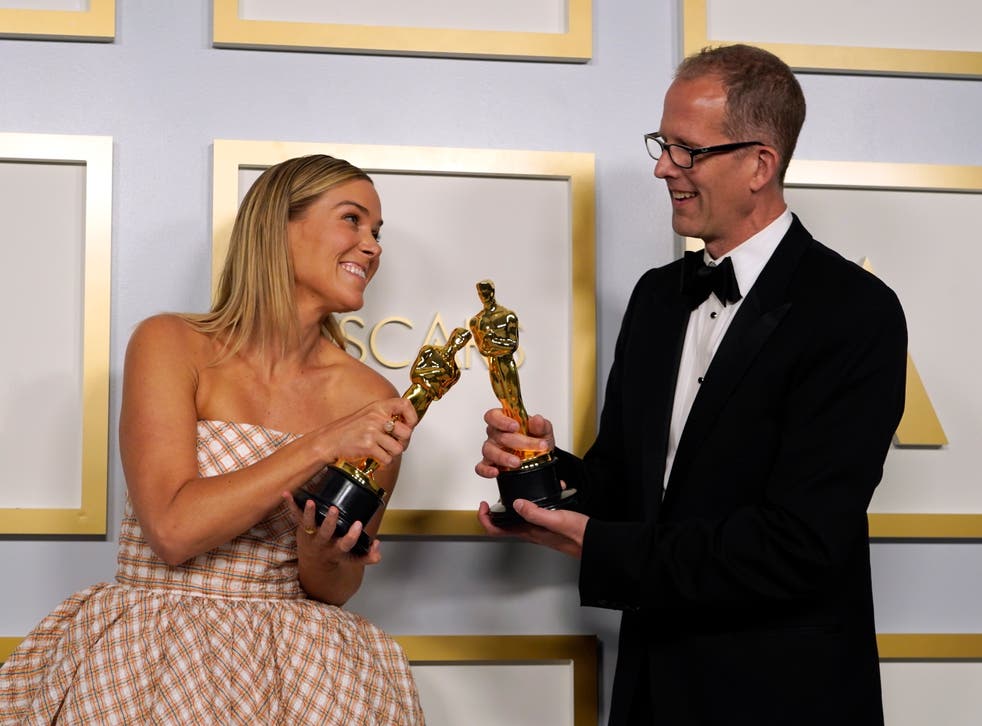 <p>Dana Murray and Pete Docter, winners of the award for animated feature film for 'Soul'</p>