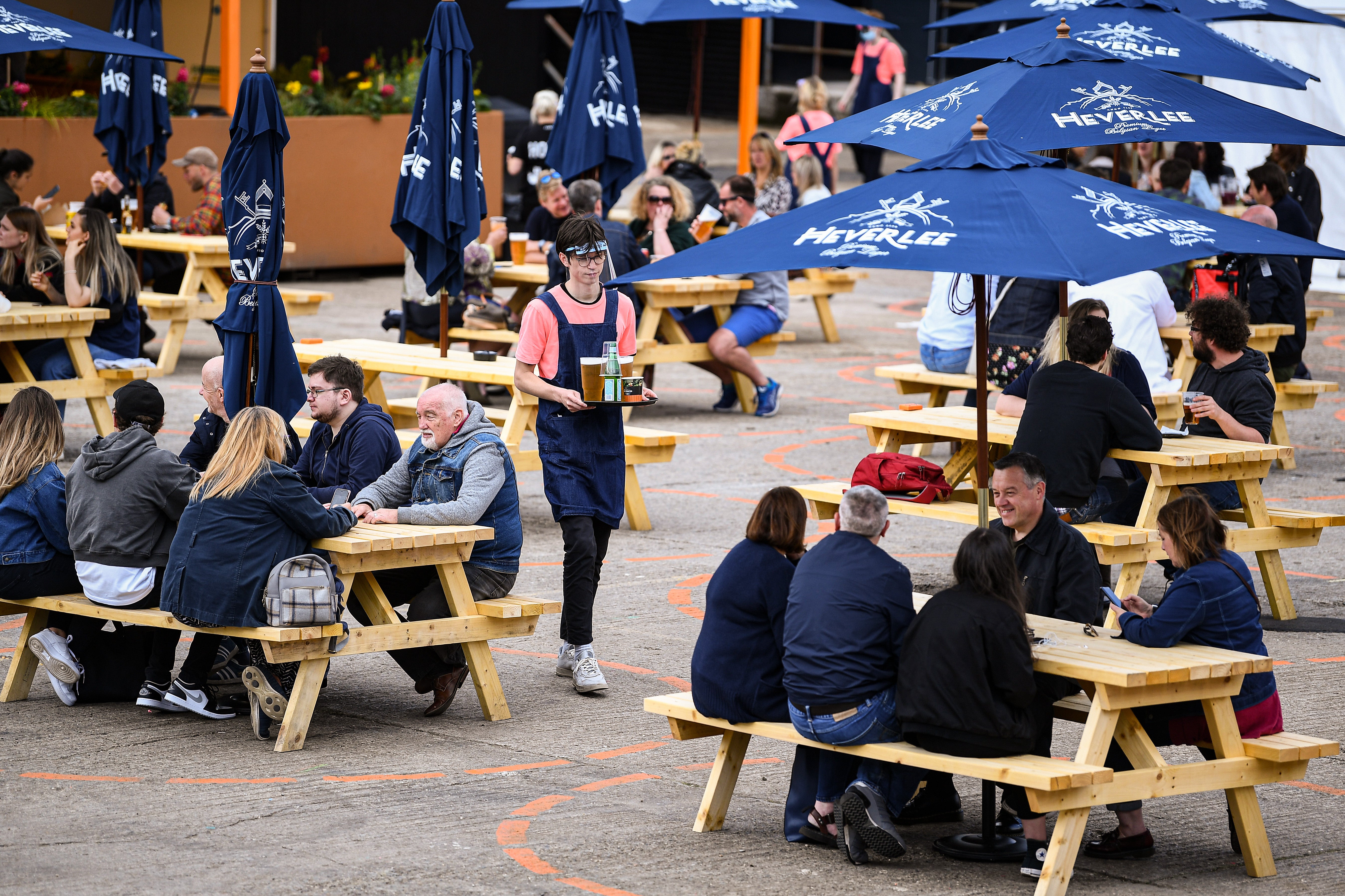 Members of the public enjoy their first drink in a beer garden at SWG3 on 6 July, 2020 in Glasgow, Scotland. Now, residents will be able to return to pubs and other venues amid an easing of Covid-19 restrictions.