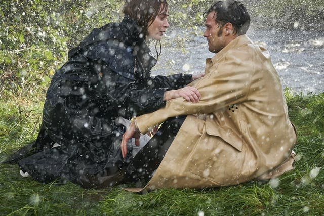 <p>Wet, wet, wet: Rosemary (Emily Blunt) and Anthony (Jamie Dornan)</p>