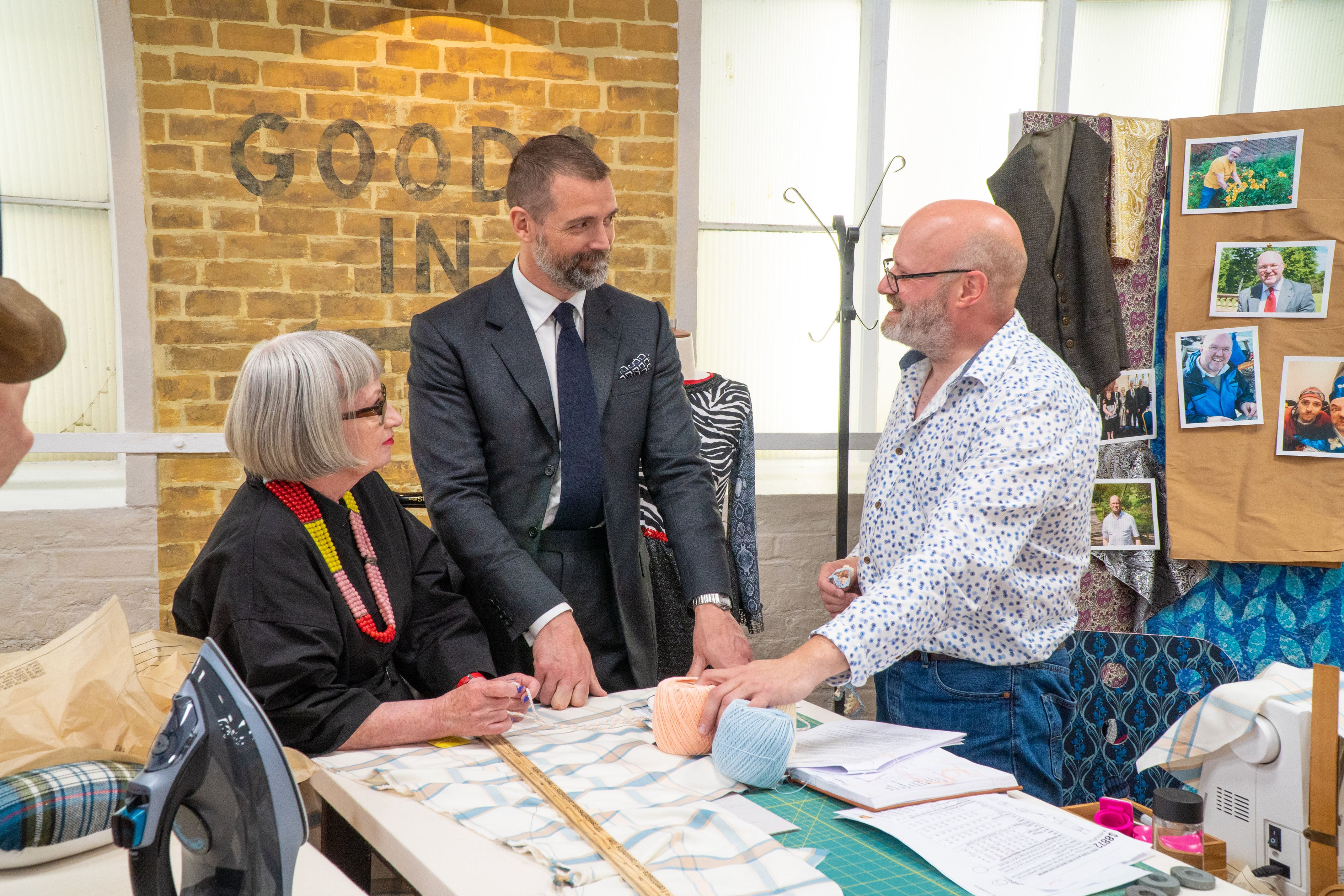Judges Patrick Grant, centre, and Esme Young talk to a Sewing Bee hopeful