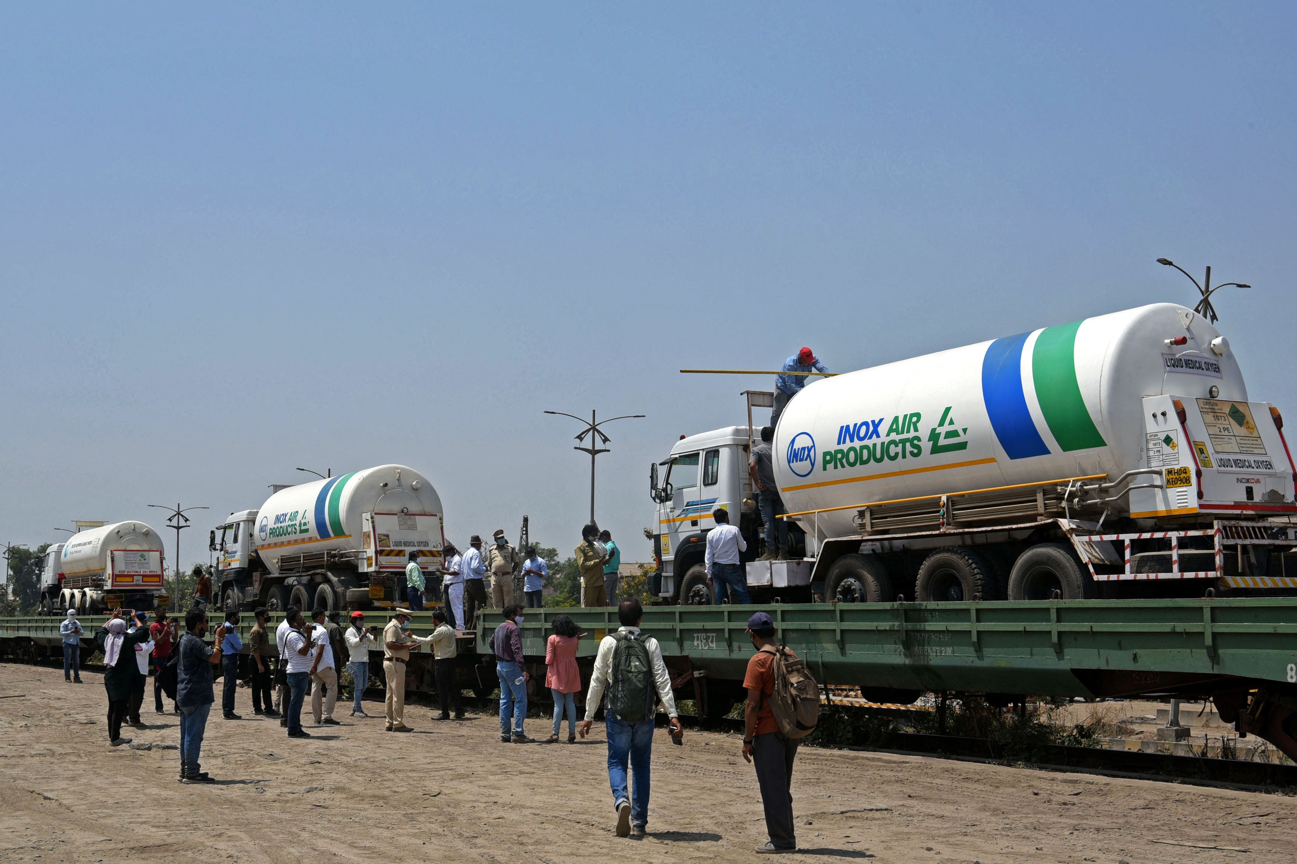 Oxygen tankers being boarded on a special ‘oxygen’ train at a goods yard in Navi Mumbai