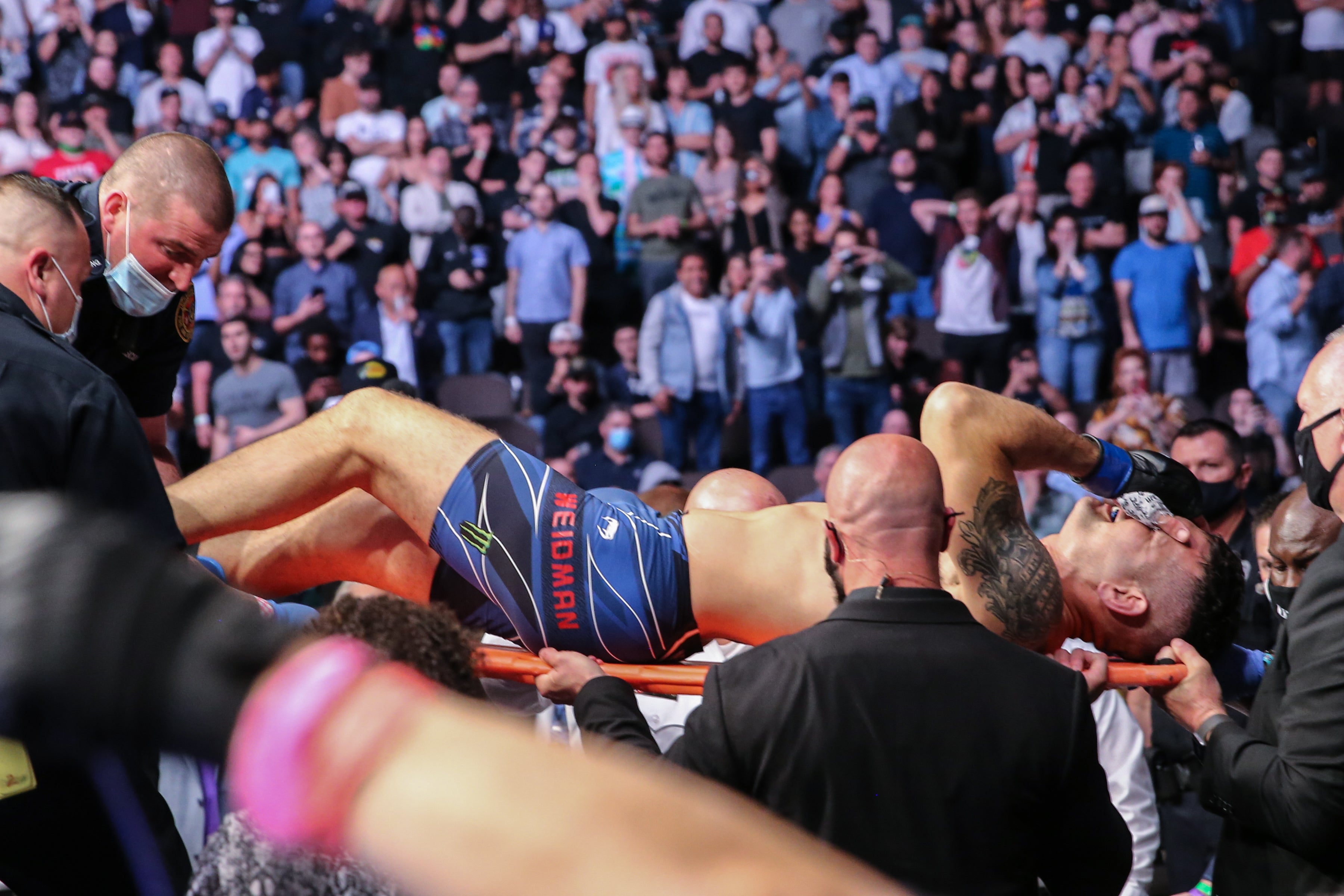 Chris Weidman was stretchered out of the VyStar Veterans Memorial Arena