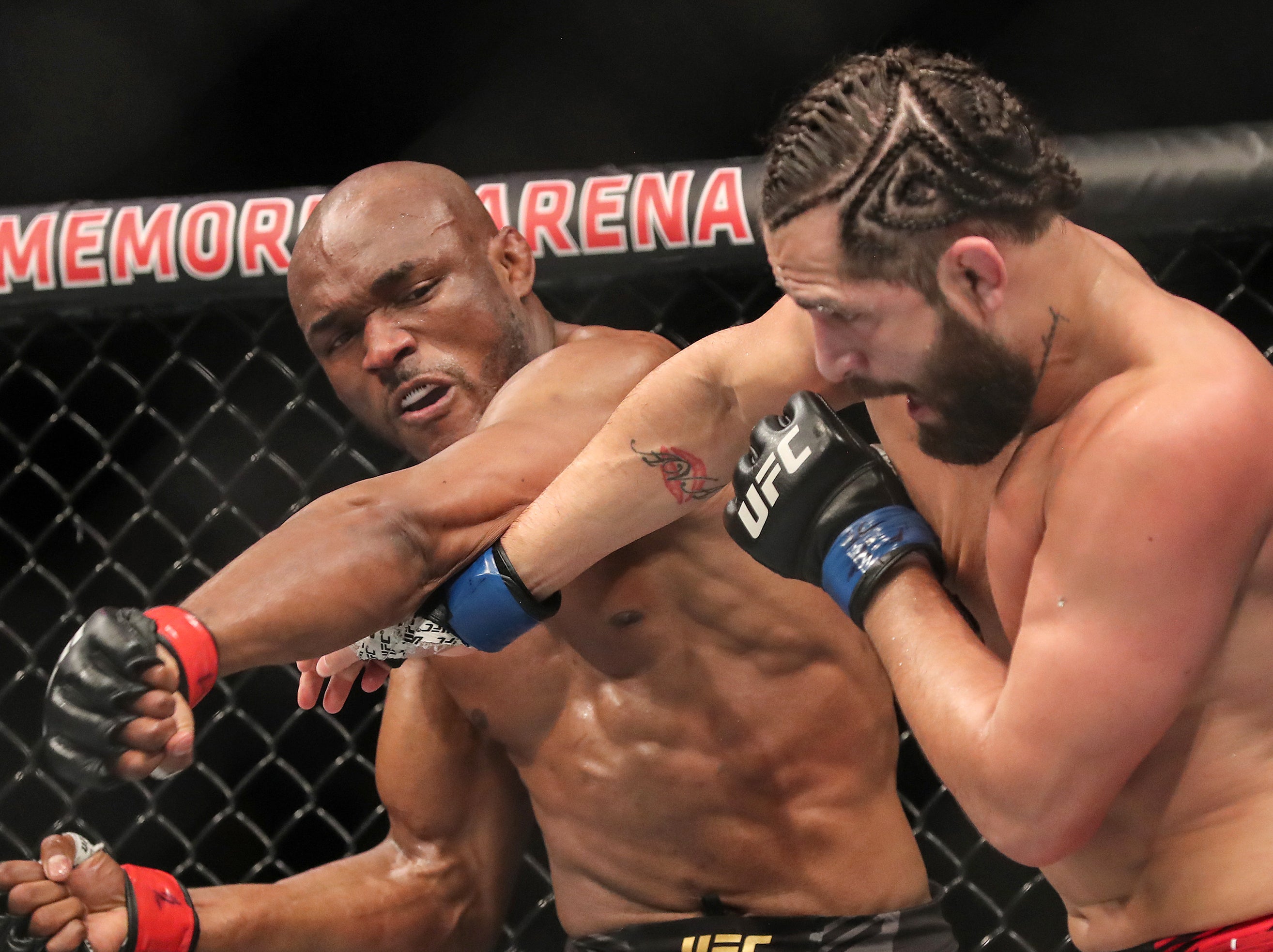Kamaru Usman (left) knocked out Jorge Masvidal in the main event of UFC 261