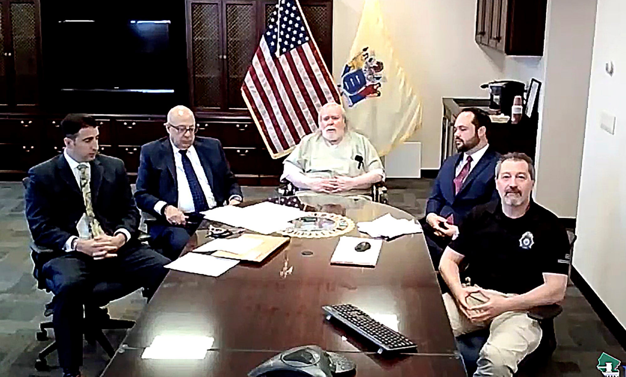 In this image taken from a New Jersey Courts virtual hearing, Richard Cottingham, center, known as the ‘Torso Killer,’ pleads guilty on 27 April 2021 to two 1974 murders