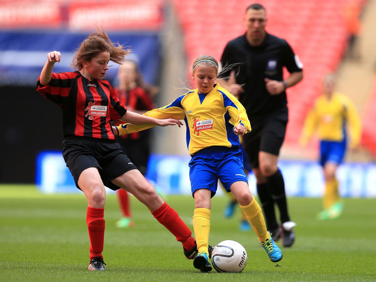 Teenage girls playing football face twice concussion risk of boys, study shows