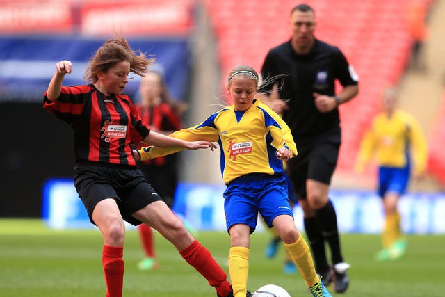 Action from the Girl’s Cup between Broadstone Middle School and Thomas Telford School at Wembley Stadium