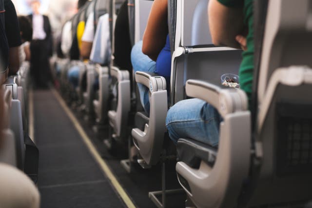 Boarding the aircraft at random can lower the risk of infection