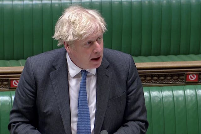 Boris Johnson speaks during PMQs today