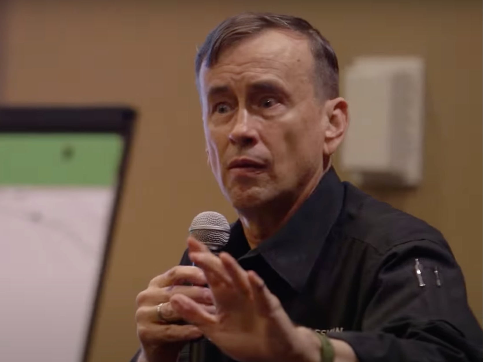 <p>Dave Grossman speaking at an event</p>