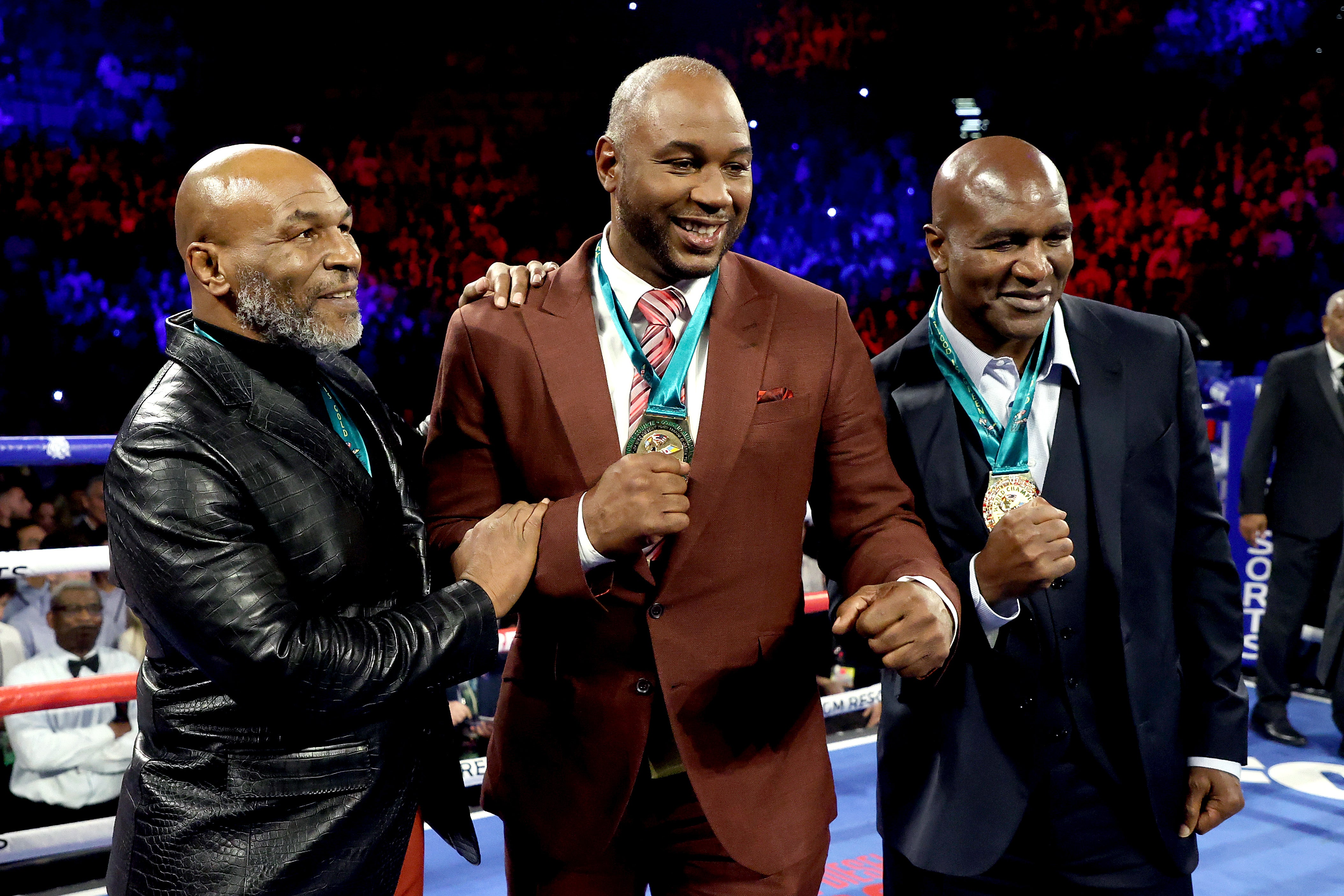 Mike Tyson with Lennox Lewis and Evander Holyfield in February 2020