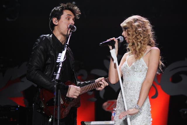 <p>Mayer on stage with former partner Taylor Swift in 2009</p>