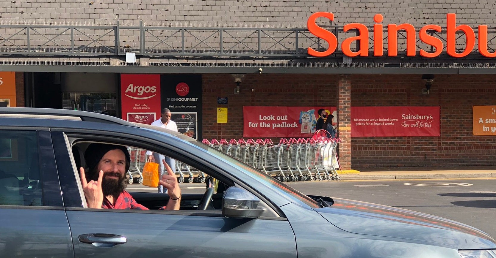 Gareth Wild, 39, pictured in his car at the Sainsbury’s in Bromley.