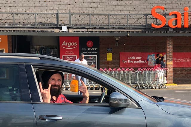Gareth Wild, 39, pictured in his car at the Sainsbury’s in Bromley. 
