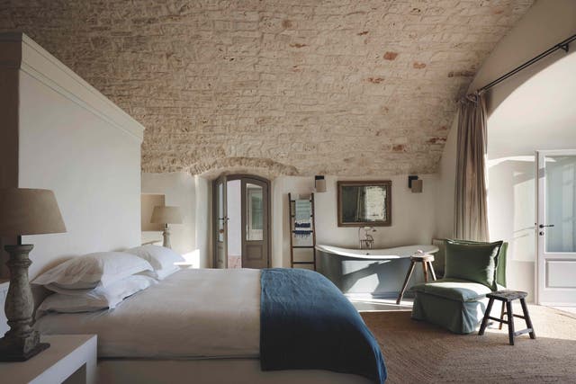<p>The natural stone walls of 300-year-old Puglia farmhouse speak for themselves</p>