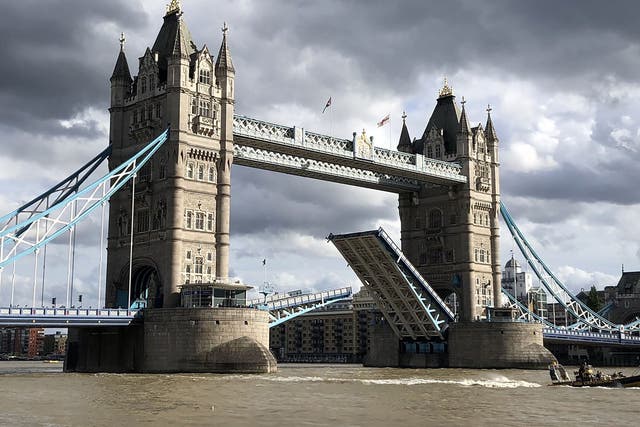 A body has been found in the search for a missing schoolboy who fell from Tower Bridge into the River Thames in London