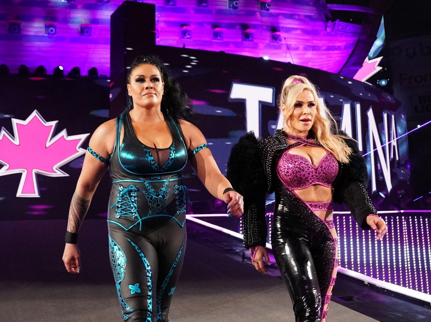 Tamina and Natalya make their way to the ring at WrestleMania