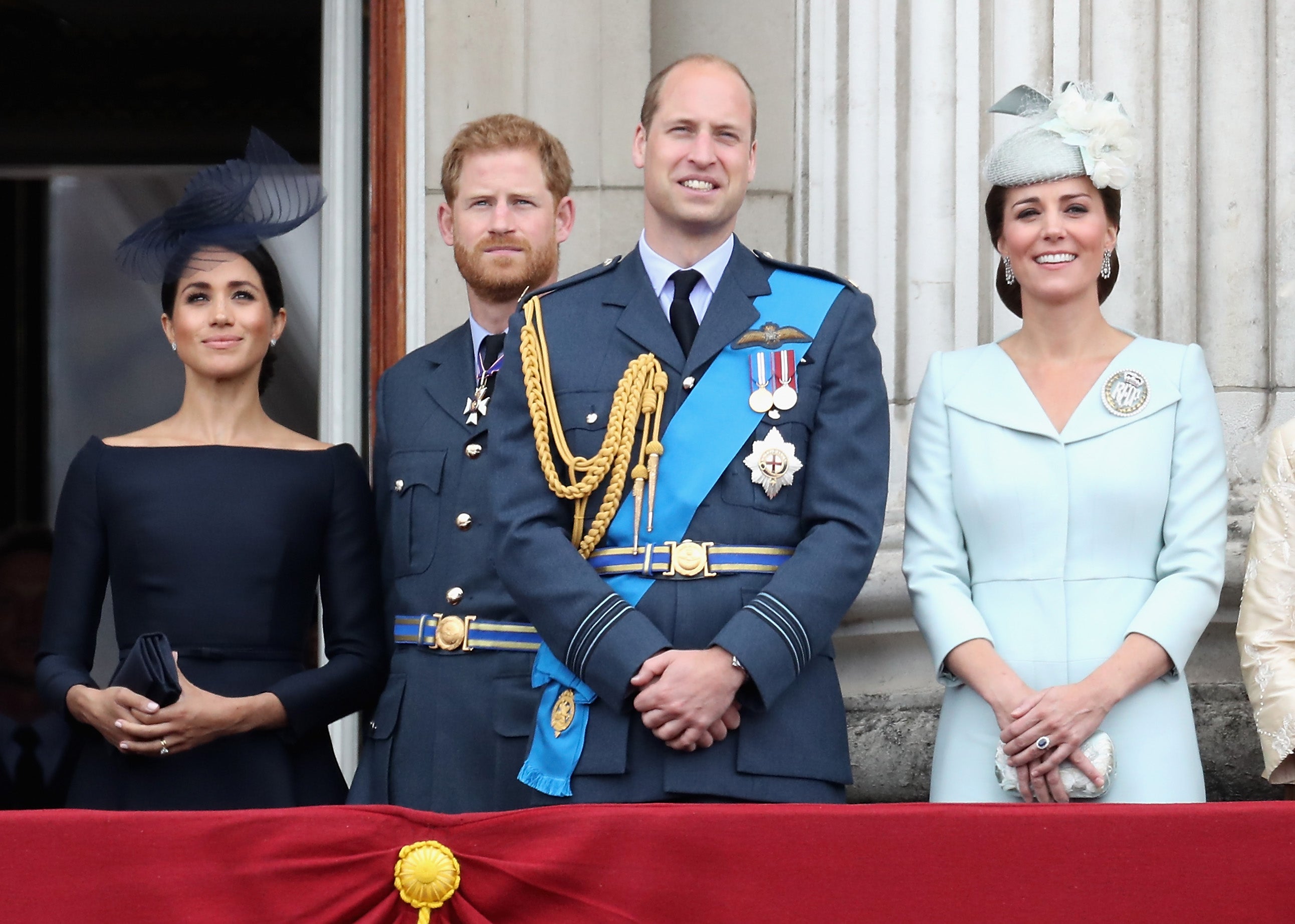 Princes William and Harry with their wives at Buckingham Palace in July 2018