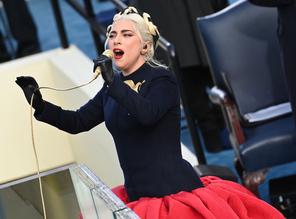 Lady Gaga sings the US National Anthem at the beginning of the swearing in ceremony of President Joe Biden on 20 January 2021, at the US Capitol in Washington, DC