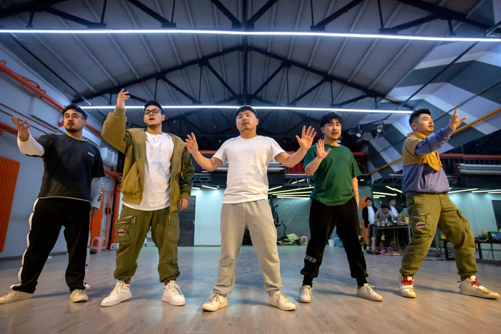 'Plus-size' boy band in China seeks to inspire fans China ...