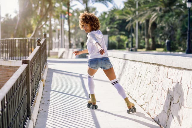 Young woman rollerskating