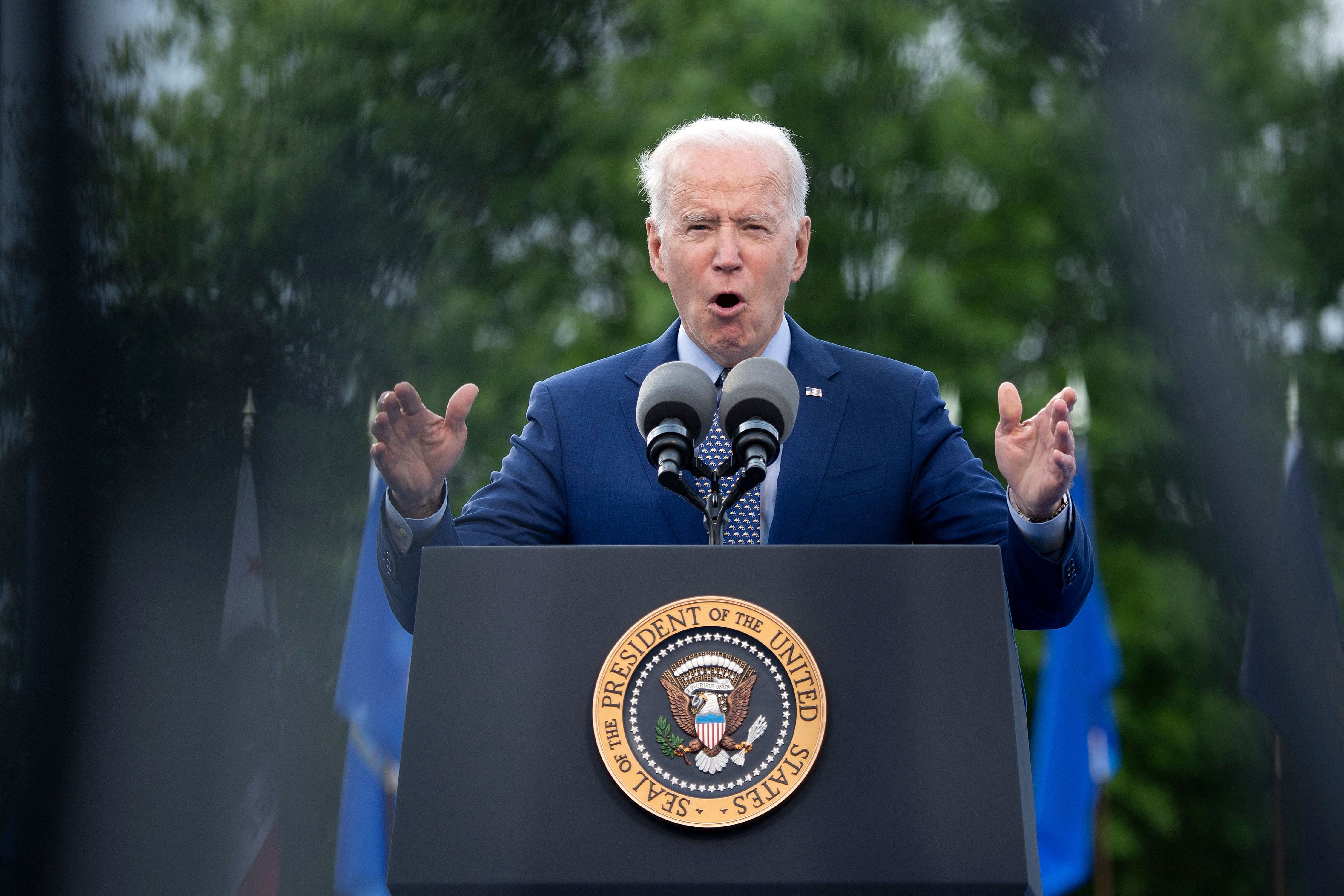 US President Joe Biden speaks during a drive-in rally at Infinite Energy Center April 29, 2021, in Duluth, Georgia, where she said that Stacey Abrams could be president “if she wanted”