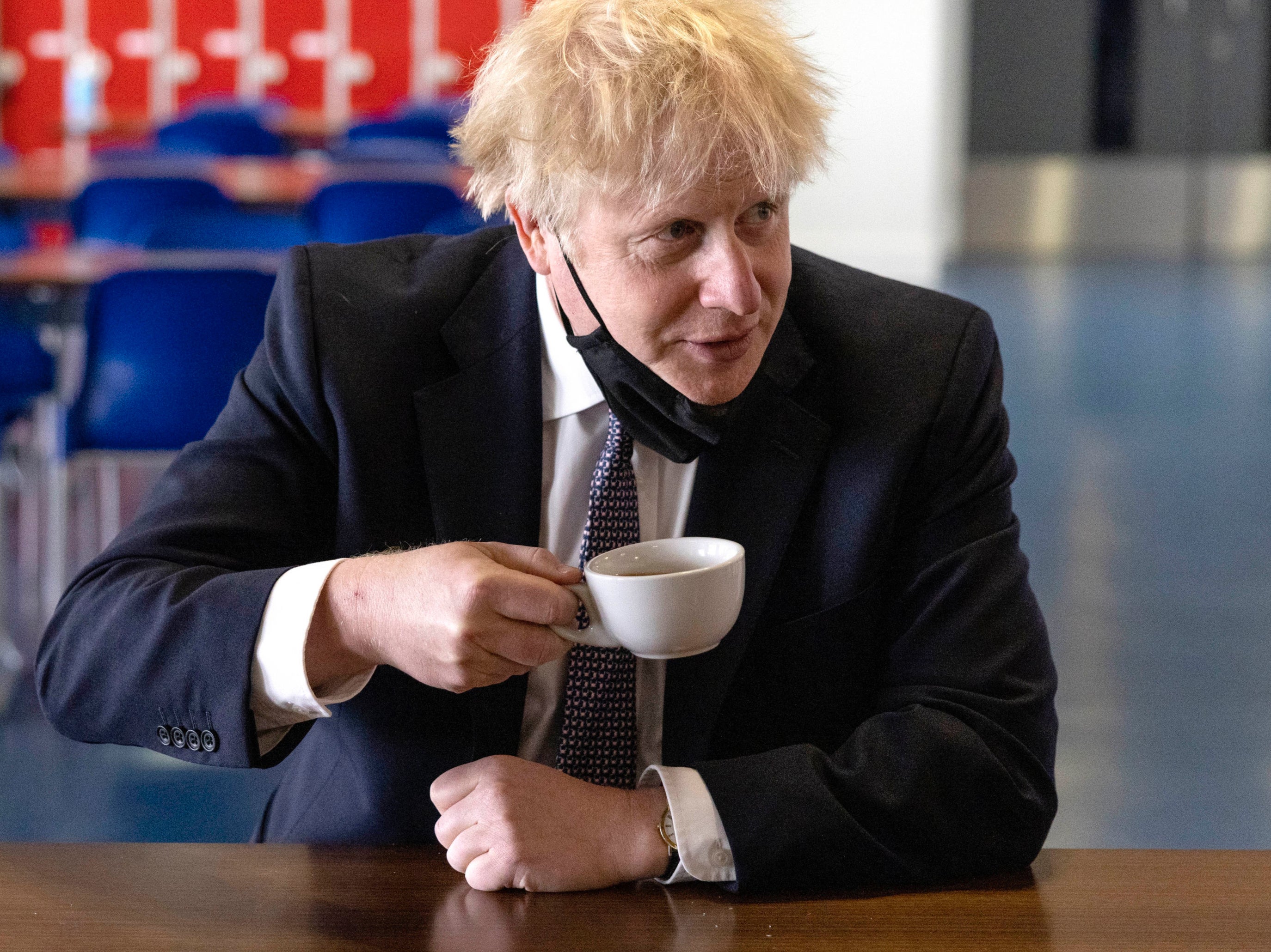 File photo of Boris Johnson drinking a cup of coffee