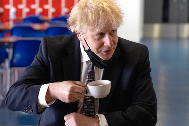 <p>File photo of Boris Johnson drinking a cup of coffee </p>
