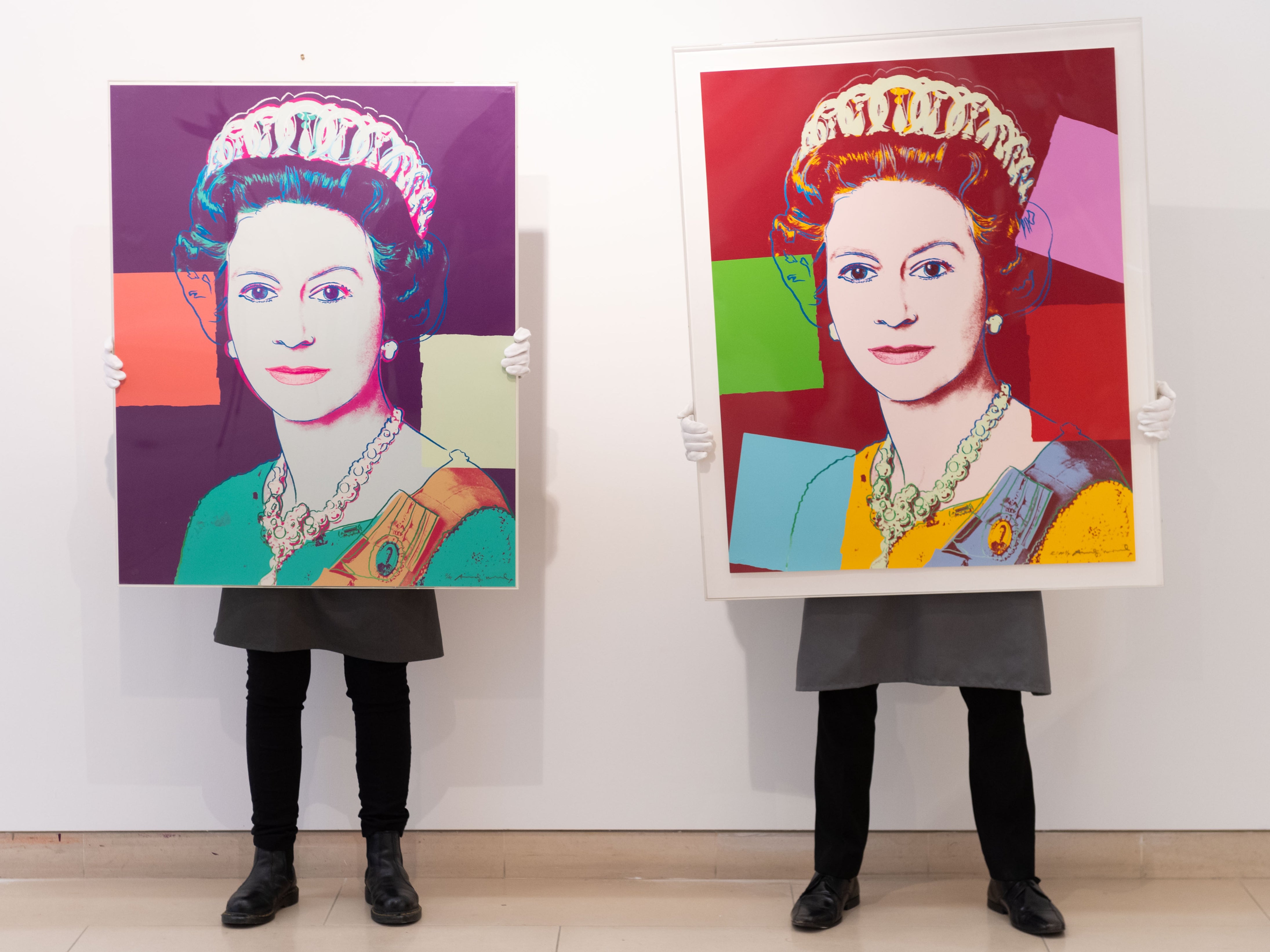 Reigning Queens by Andy Warhol is displayed during preparations for online sales at Christie’s Auction House on 26 March 2021