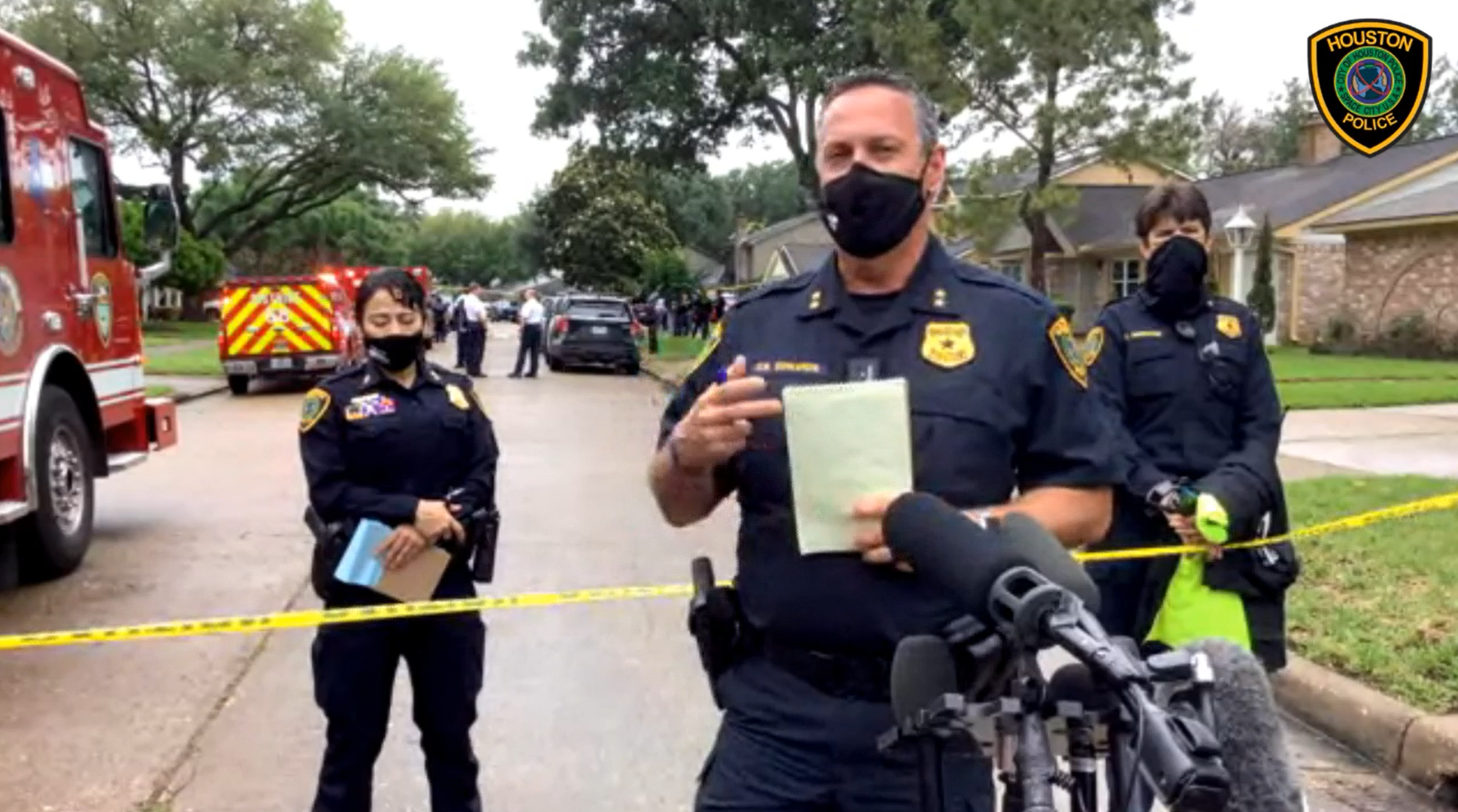 Houston Police’s Daryn Edwards outside a home where 91 people were found in possible human smuggling case