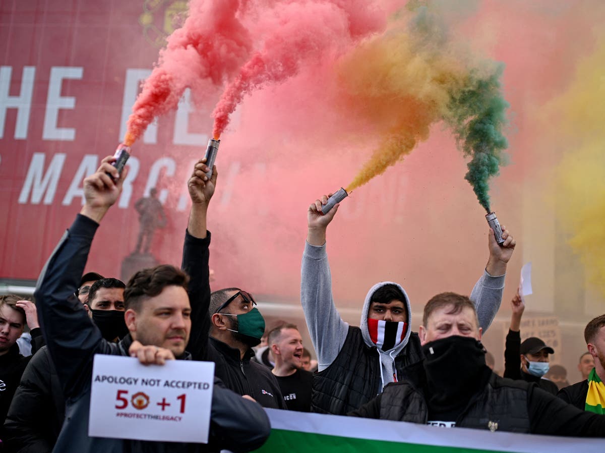 Manchester United fans invade Old Trafford pitch in anti-Glazers protest before Liverpool game