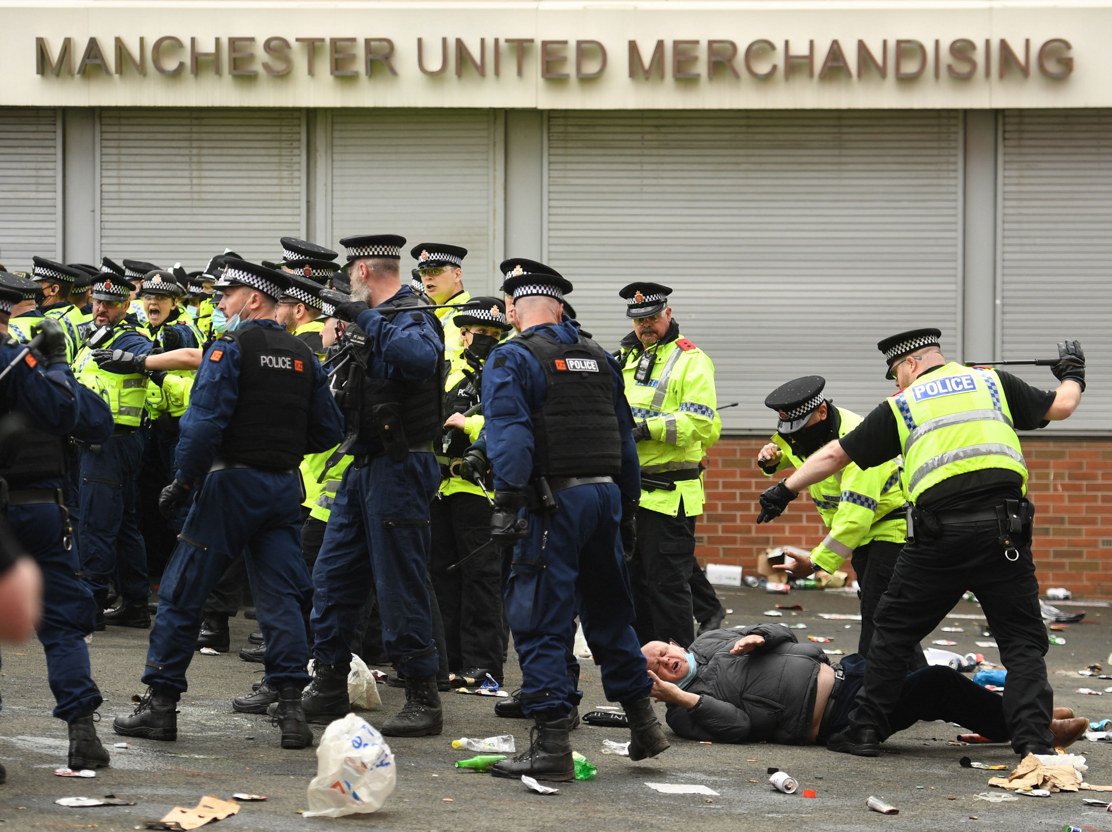 Police attempt to manage the situation outside Old Trafford