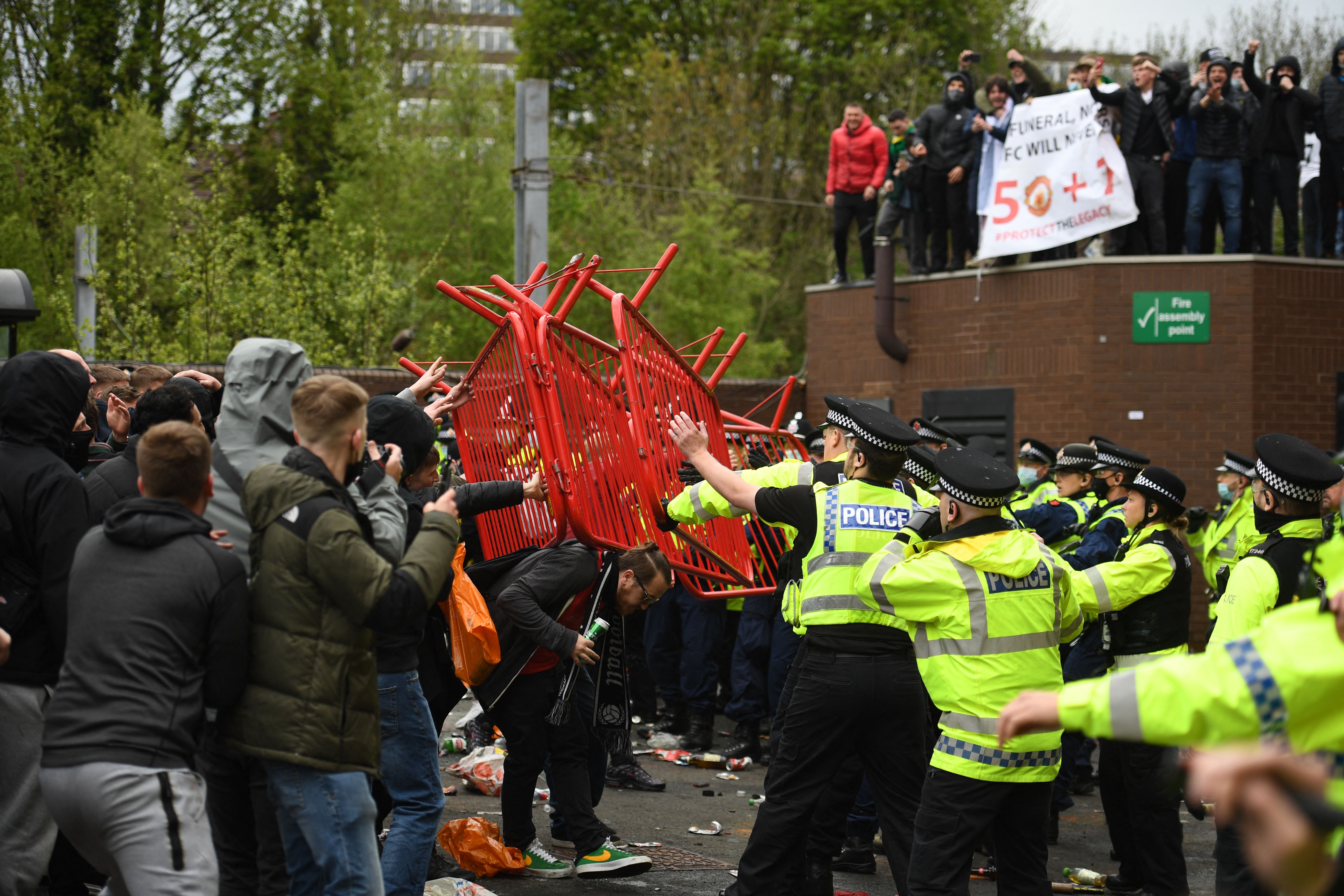 Police clashed with supporters outside Old Trafford