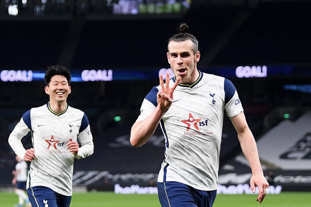 Gareth Bale (right) scored three times before Son Heung-min added Spurs’ fourth