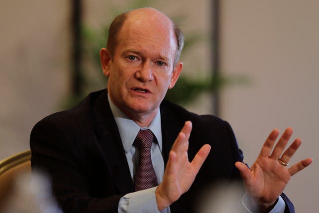 <p>Senator Chris Coons speaks at a news conference in Abu Dhabi </p>