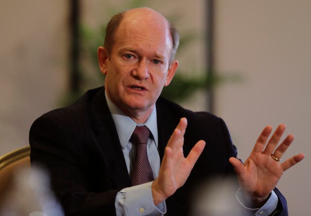 <p>Senator Chris Coons speaks at a news conference in Abu Dhabi </p>