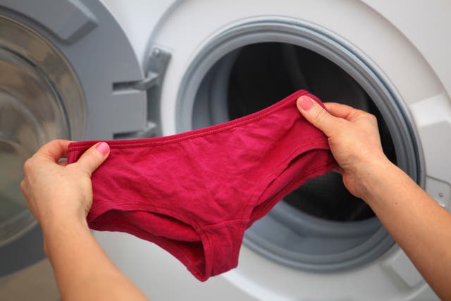 Woman holding underwear