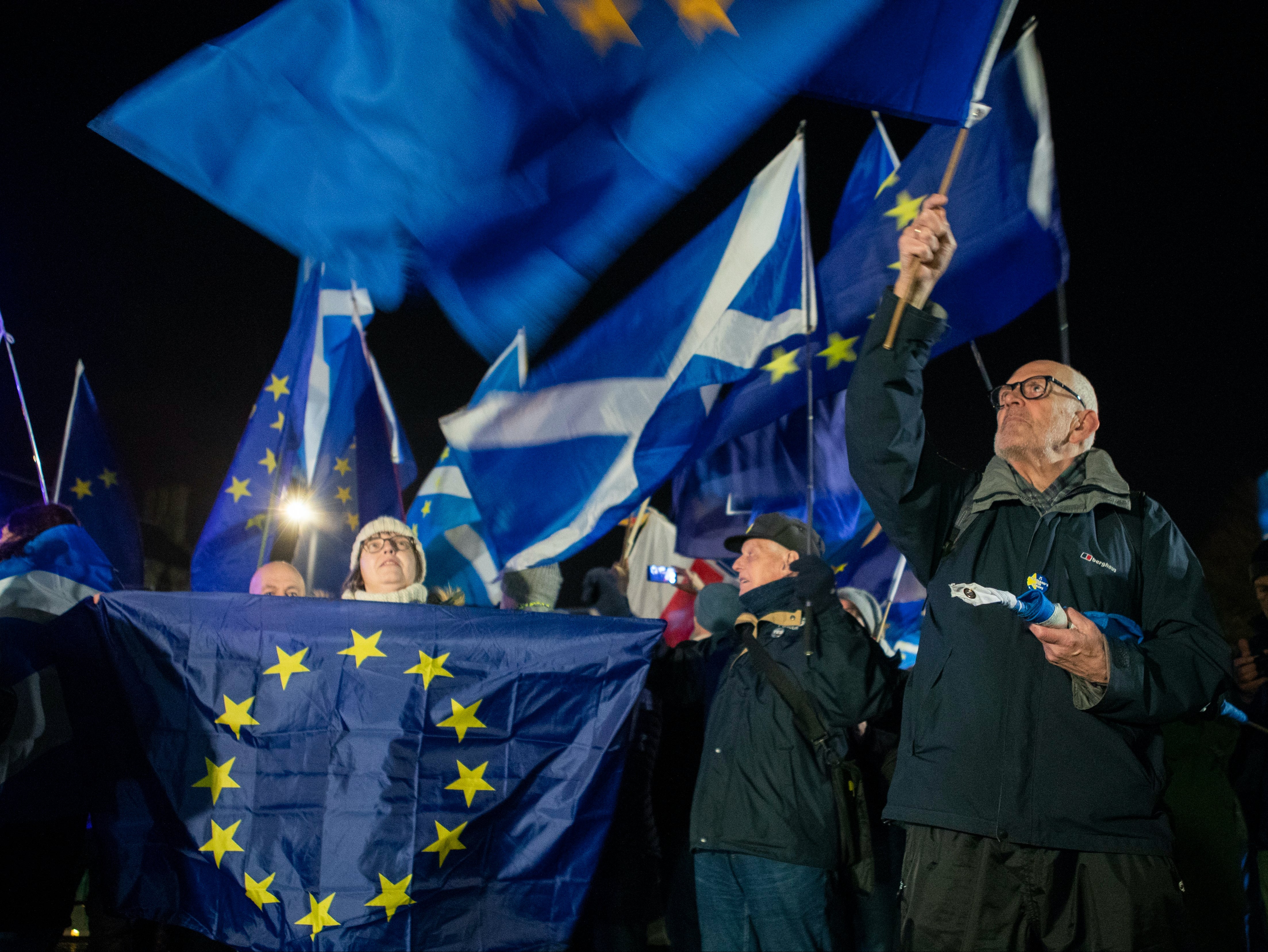 Pro-EU campaigners outside the Scottish Parliament as UK leaves bloc