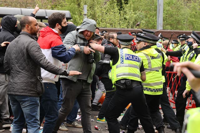 Manchester United fans and police clash outside Old Trafford