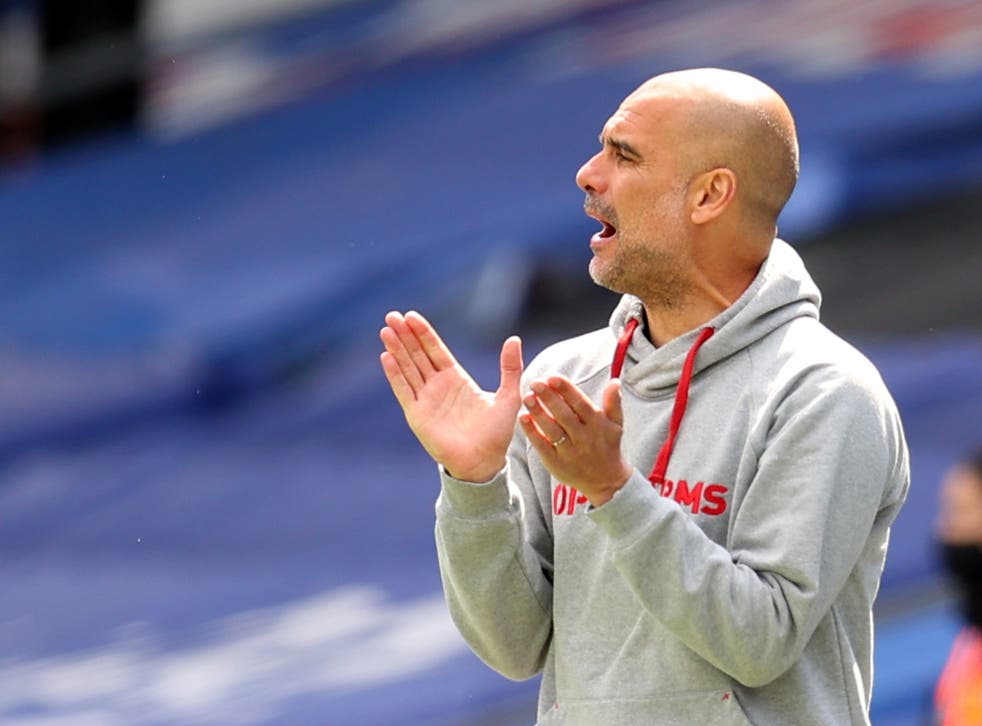 Pep Guardiola gestures on the touchline in City’s win at Crystal Palace